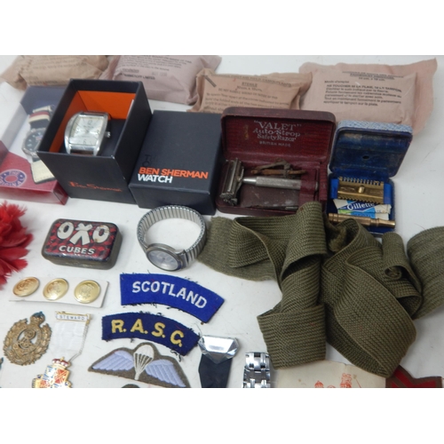 295 - A Quantity of Military Cloth & Metal Badges, Watches etc (lot)