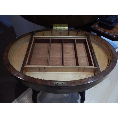 273A - Victorian Oval Walnut Inlaid Sewing Table with Hinged Top Revealing Fitted Interior Sitting on Carve... 