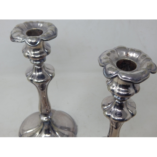 196 - A Pair of Late 19th Century Elkington & Co Silver Plated Candlesticks: Height 26cm