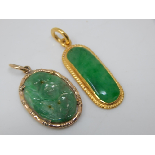 111G - High Carat Jade Pendant together with a further Gold Jade Pendant: Gross weight 5.70g