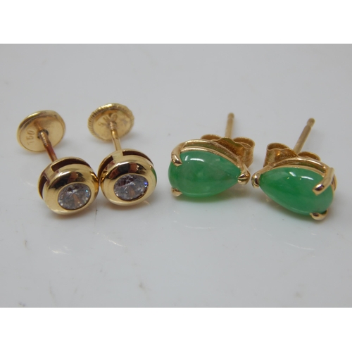 A Pair of 18ct Gold Diamond Solitaire Earrings together with a Pair of 14ct Gold Jade Set Earrings.