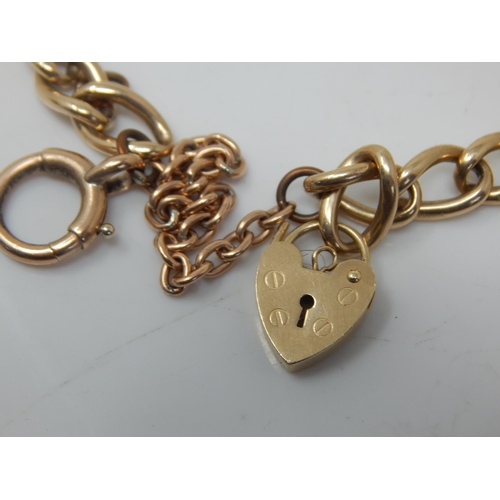 200 - 9ct Gold Bracelet with Padlock Clasp. Weight 19.7g