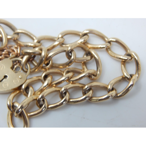 200 - 9ct Gold Bracelet with Padlock Clasp. Weight 19.7g