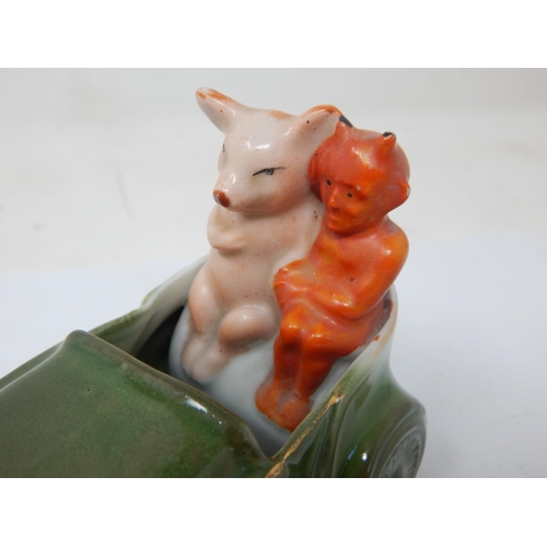 200B - Edwardian Novelty Ceramic Group of a Pig in a car with the devil. 15cm wide