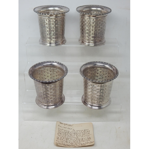 A Set of Four Good Silver Plated Bottle Holders Gifted to our vendors family in 1927 from Corfe Castle with original note