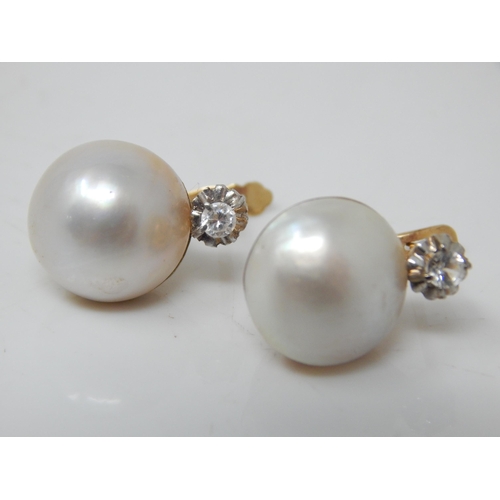 215 - A Pair of 18ct Gold Diamond & Pearl Earrings: Gross weight 4.97g