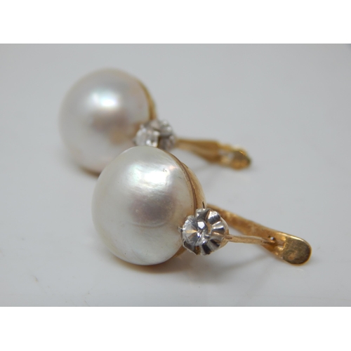 215 - A Pair of 18ct Gold Diamond & Pearl Earrings: Gross weight 4.97g