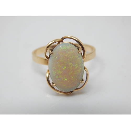 218 - 14ct Gold Ring Set with an Opal Measuring 13mm x 8mm: Ring Size O: Gross weight 2.68g