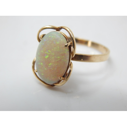 218 - 14ct Gold Ring Set with an Opal Measuring 13mm x 8mm: Ring Size O: Gross weight 2.68g