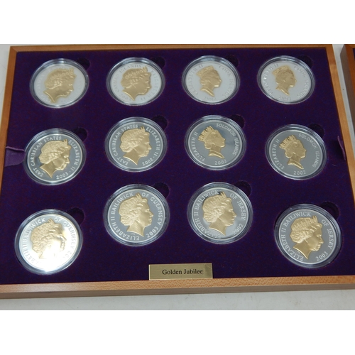 29 - Queen Elizabeth II Jubilee Silver Crown collection housed in original wooden collectors box with COA... 