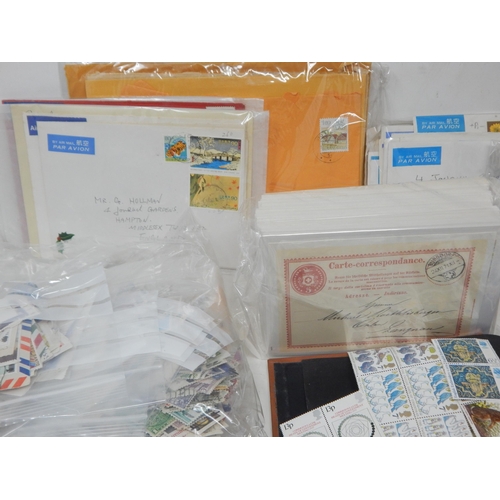 33 - A large collection of stamps and correspondence cards.