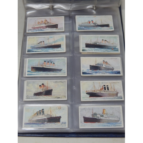 63 - Group of cigarette cards in box and album