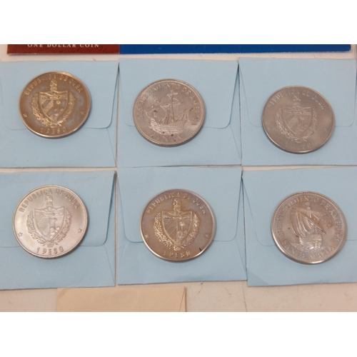 42 - A large quantity of Cupro Nickel Crown size and other denominations some coloured, many housed in ca... 