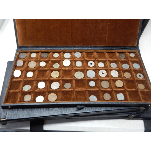 56 - A large collection of World coinage housed in collectors case with trays