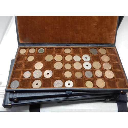 56 - A large collection of World coinage housed in collectors case with trays