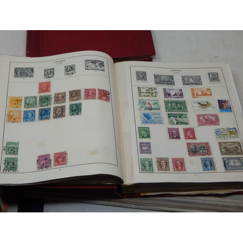 60 - A pair of vintage Stamp Albums containing a good selection of stamps from GB and all over the world ... 