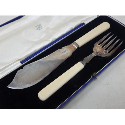 67 - Hallmarked Silver Fish serving knife and fork in fitted case with original price tag of £100 as purc... 