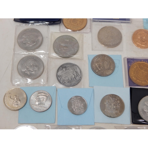 42 - A large quantity of Cupro Nickel Crown size and other denominations some coloured, many housed in ca... 