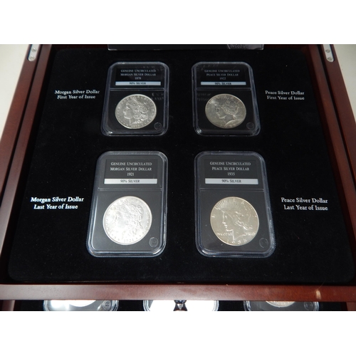 77 - Complete Collection of 28 Brilliant Uncirculated U.S Silver Dollars contained in a five drawer cabin... 