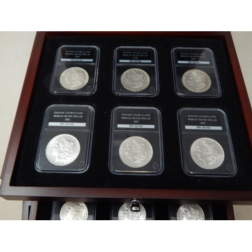 77 - Complete Collection of 28 Brilliant Uncirculated U.S Silver Dollars contained in a five drawer cabin... 