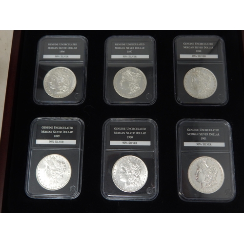 77 - Complete Collection of 28 Brilliant Uncirculated U.S Silver Dollars contained in a five drawer cabin... 