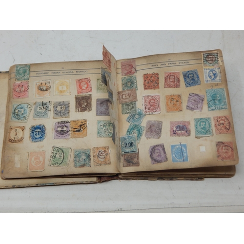 85 - A Victorian Stamp Album Dated 1893 containing a large quantity of stamps.