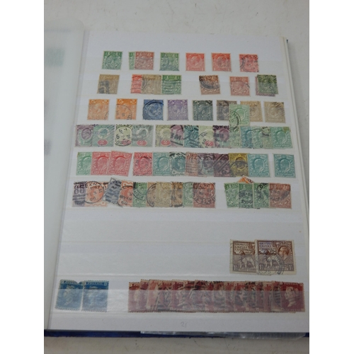 86 - A Stock Book containing a quantity of Victorian & later stamps.