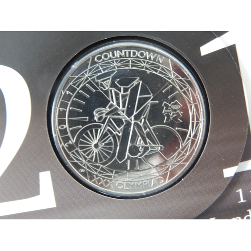 90 - Royal Mint Countdown to London 2012 Olympic Games £5 Coins in Packs of Issue (7)