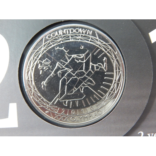 90 - Royal Mint Countdown to London 2012 Olympic Games £5 Coins in Packs of Issue (7)