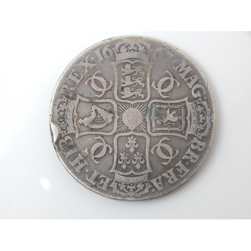 101 - Charles II Silver Decimo Nono Crown 1667