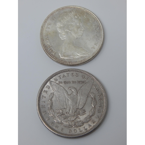 164 - USA Silver Dollar 1900 together with a Canadian Silver Dollar 1966