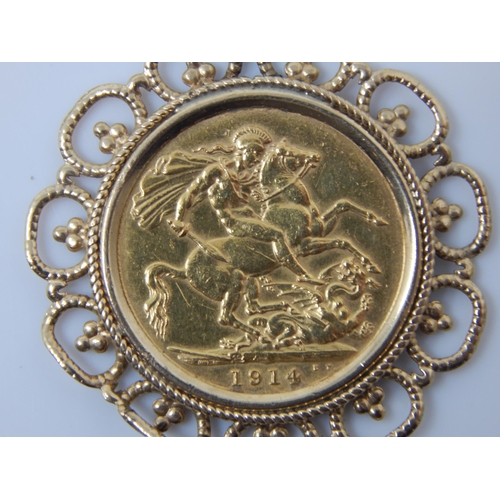 169 - George V Full Gold Sovereign 1914 in 9ct Gold Mount with 9ct Gold Chain: Gross weight 13.99g