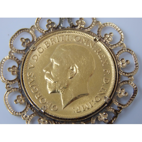 169 - George V Full Gold Sovereign 1914 in 9ct Gold Mount with 9ct Gold Chain: Gross weight 13.99g