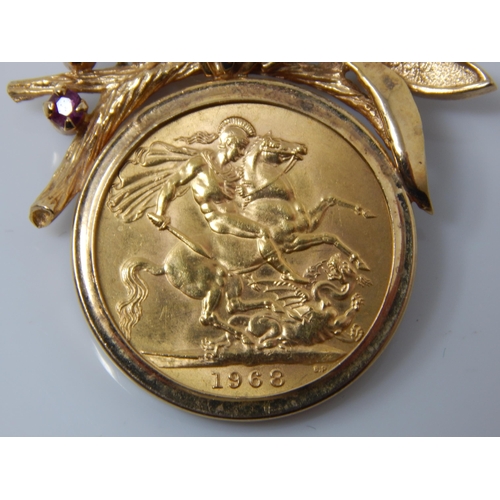 170 - QEII Full Gold Sovereign 1968 in 9ct Gold Brooch Mount Set with Rubies. Gross weight 12.03g