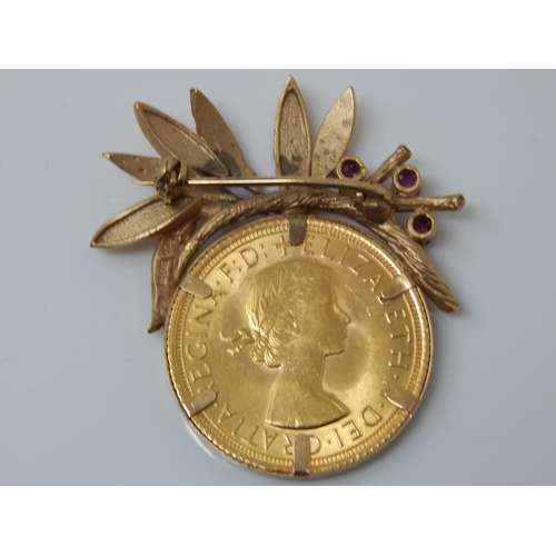 170 - QEII Full Gold Sovereign 1968 in 9ct Gold Brooch Mount Set with Rubies. Gross weight 12.03g