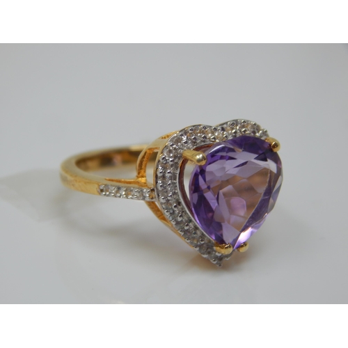 264 - Gold on Silver Ring set with a Heart Shaped 7.48ct Amethyst & White Zircons: Ring Size N/O: Gross we... 