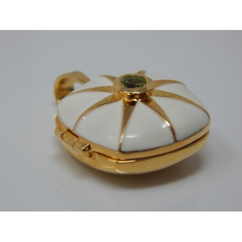 268 - Gold on Silver Enamel Locket Set with a central Peridot: 20mm Diameter