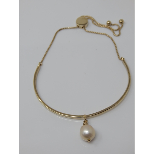 269 - Gold on Silver Slider Bracelet Set with a Cultured Pearl.