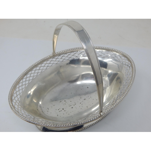 278 - An Oval Silver Bon Bon Basket with Pierced Rim & Swing Handle: Hallmarked Birmingham 1919 by Mappin ... 