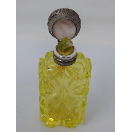 279 - A Victorian Silver Mounted Uranium Glass Scent Bottle with Original Stopper: Height 8cm