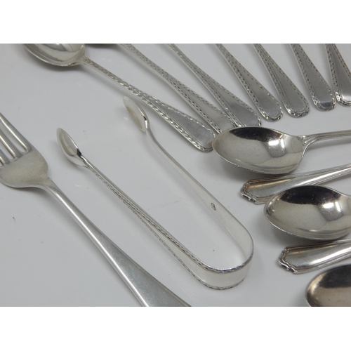 289 - A Quantity of Hallmarked Silver Tea & Coffee Spoons, Tongs & Forks: Weight 232g (lot)