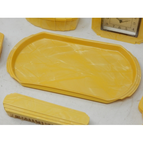 293 - An Art Deco Halex Yellow Bakelite Dressing Table Set Comprising Tray, Mirror, Brushes, Jewellery Box... 