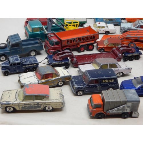 396 - A Box Full of Vintage Playworn Vehicles together with Playmat