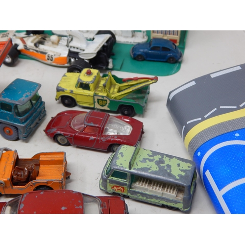 396 - A Box Full of Vintage Playworn Vehicles together with Playmat