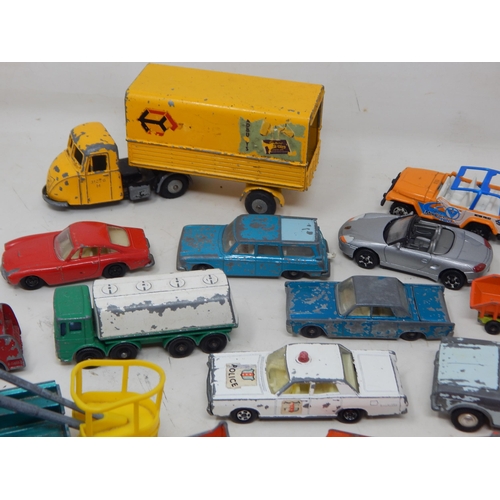 396 - A Box Full of Vintage Playworn Vehicles together with Playmat