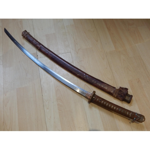 369 - A 17th/18th Century Japanese Samurai Sword with early Signed Tang & 2 Punched Holes for Pegs: This i... 