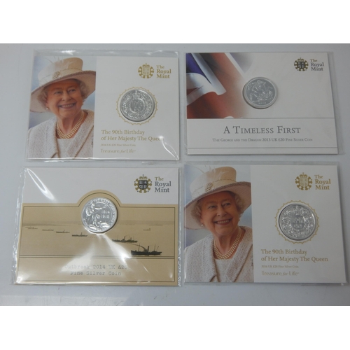 84 - Group of 4 x Silver Twenty Pound coins in Royal Mint packs