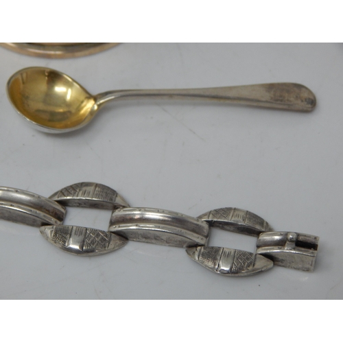 66 - A children's silver rattle, group of hallmarked Silver napkin rings, etc total weight 189.43g.