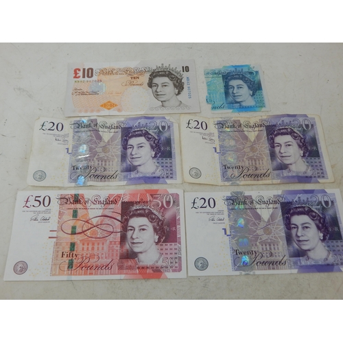 73 - Bank of England £50 note, 3 x £20 notes and a £10 note plus £5 note (torn in half) total face value ... 
