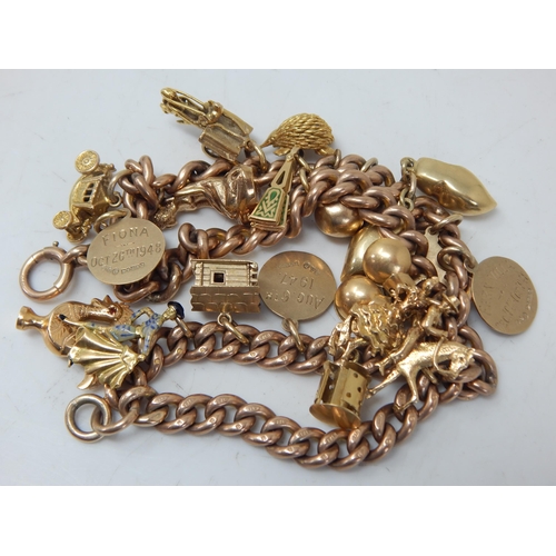 430 - 9ct Gold Charm Bracelet with Attached Charms: Weight 99.02g